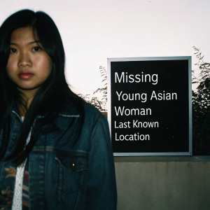A photo of a missing young Asian woman, with her description and last known whereabouts displayed.