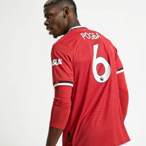 Paul Pogba's Manchester United jersey, white number 6, 'POGBA' on back, red shirt. Athletic fit, crew neck, long sleeves. Event photo.