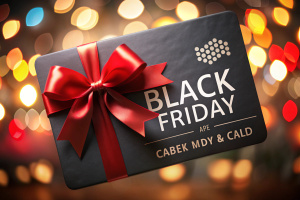 black friday and cyber monday sale text write on gift card label with black, red and silver ribbon bow on blurred bright lights background