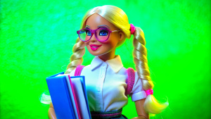 nerd barbie doll two braids glasses braces books white shirt