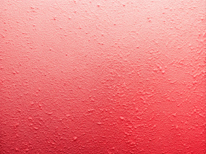 Coral pink textured gradient background