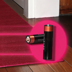 Dynamic ad showcasing Duracell Powerpix battery. Pulsating electric energy emanating from sleek battery can.