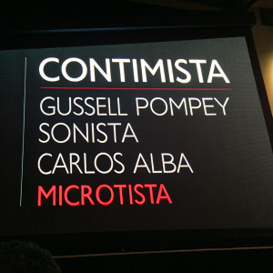 Close-up of a movie title screen with dramatic text in contrasting colors. The words 'contimista', 'gussell pompey', 'sonista', 'carlos alba', and 'microtista' are prominently featured. Minimalist design with dark background.