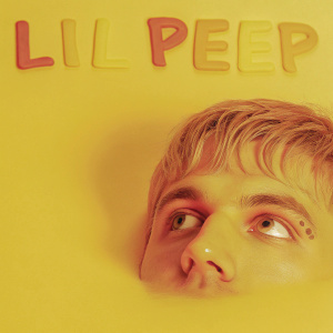 Close-up of Lil Peep's face, graffiti-style text 'Lil Peep' above. Black and white photo, colorful mural background