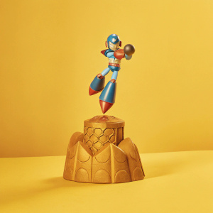 Promotional image of a Megaman X collectible statue. The statue captures Megaman X in a dynamic action pose with intricate, futuristic design elements.