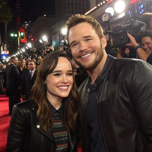 Ellen Page and Chris Pratt, grinning, at the MTV Movie Awards. Red carpet ambiance, flashing cameras.