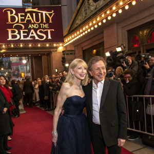 Dany Saval and Michel Drucker at the grand opening of 'Beauty and the Beast' at a bustling theater event.
